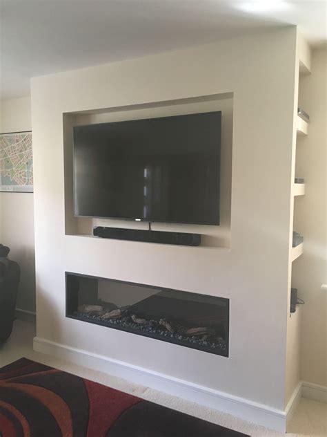 Modern Wall Mounted TV with Inset Fireplace