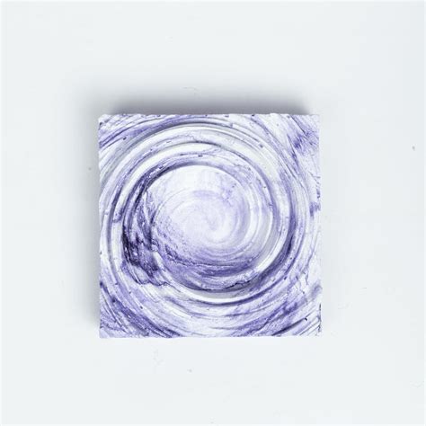 New Cyclone Orchid Marble - Spiral Design ashtray resting on a square ...