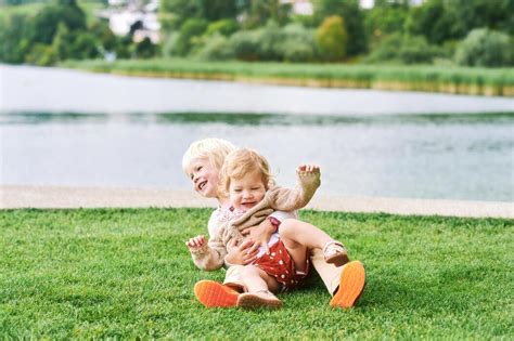 Parents and Kids Playing 的图像结果