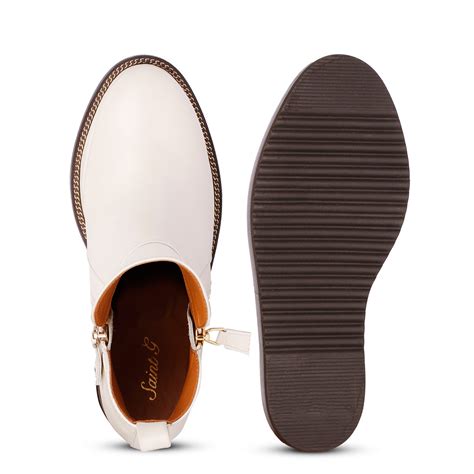 Get Stylish with Saint Galena Off-White Wedge Ankle Boots! – SaintG India