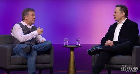 Elon Musk speaks during an interview with head of TED Chris Anderson (out of frame) at the TED2022: