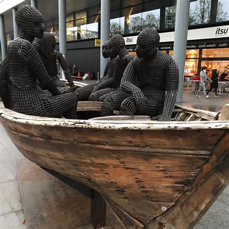 WOODEN BOAT WITH SEVEN PEOPLE SCULPTURE (2026) All You Need to Know ...