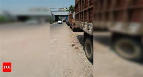 illegal parking on road side - Times of India