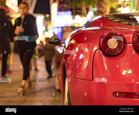 Back view of red ferrari. and tail lights Stock Photo - Alamy