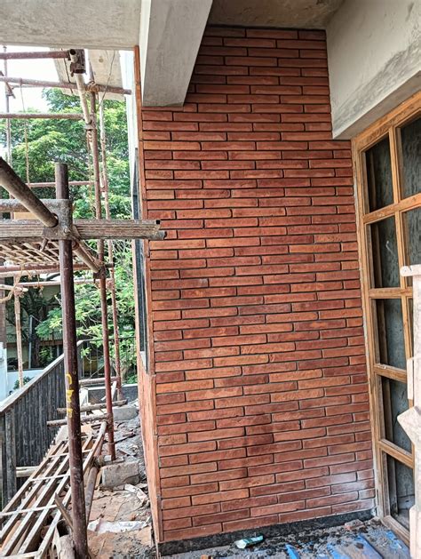 Image result for Rock Cladding Over Brick