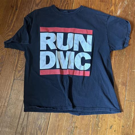 Vintage Run-DMC shirt with classic logo. No tag,... - Depop