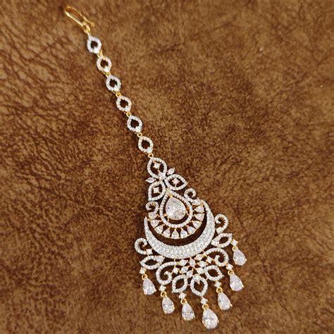 GORGEOUS GOLD PLATED DIAMOND LOOK BRIDAL MAANG TIKKA – Sanvi Jewels