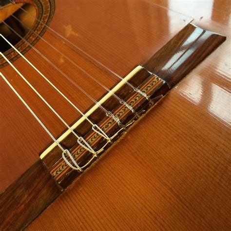 Stringing Nylon String Guitar 的图像结果