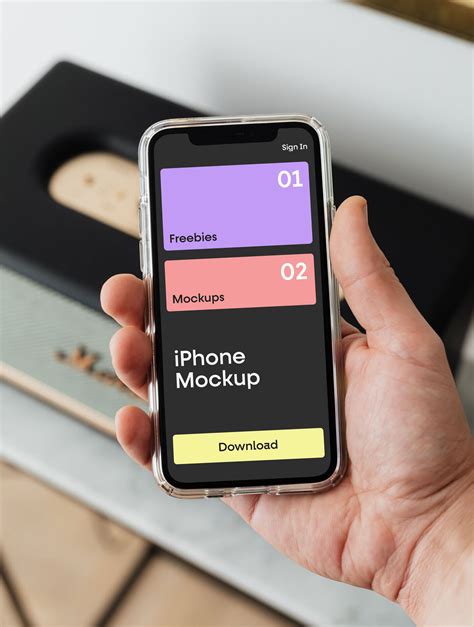 Realistic Mockup of an iPhone in Hand Free Download | Resource Boy