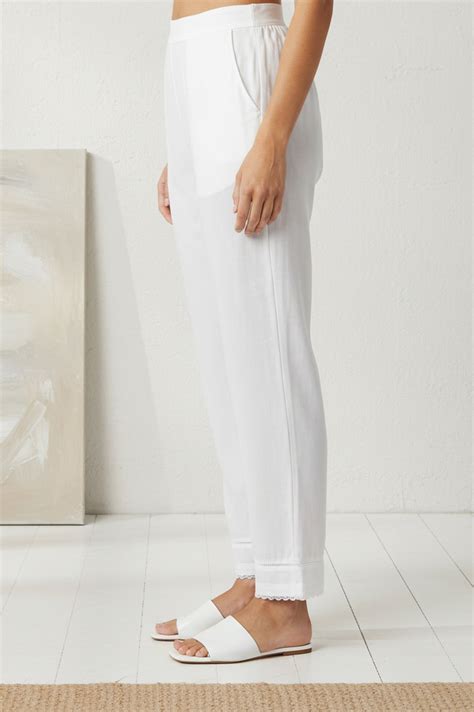 Buy White Solid Pure Cotton Ankle Length Trousers Online for Woman ...