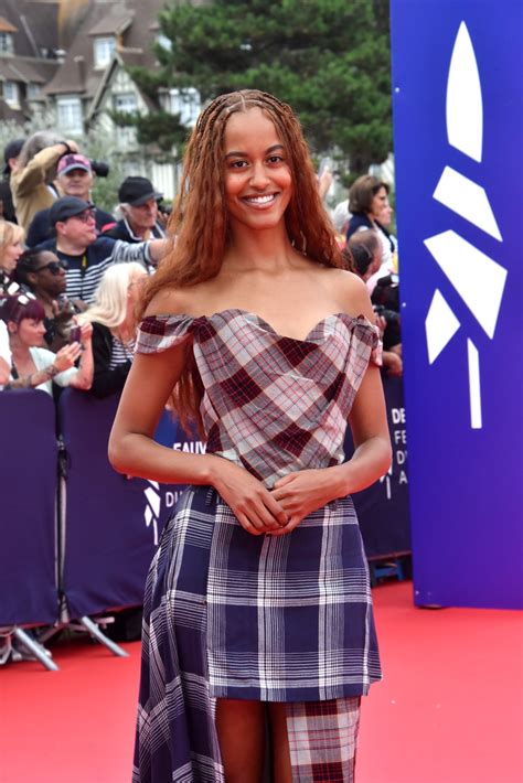 Michelle Obama makes first comments after daughter Malia drops last name: 'She's trying to make ...