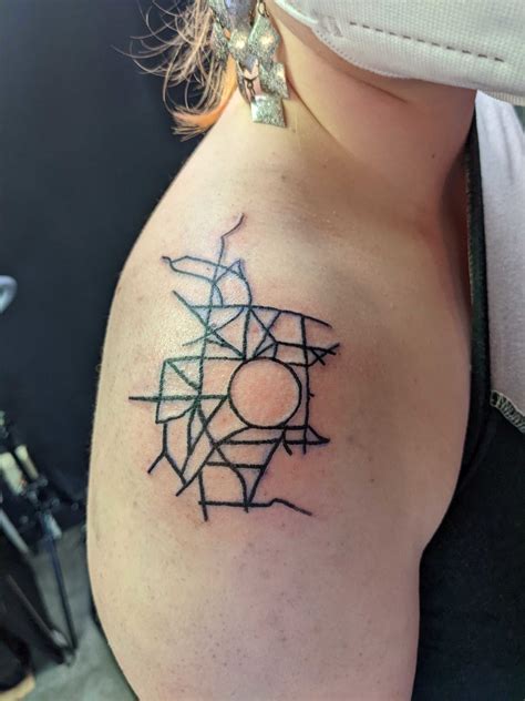 Student's Earlham-inspired tattoo keeps 'The Heart' close : Earlham College