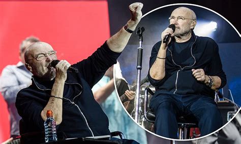 Phil Collins, 68, performs from his chair during concert in Berlin ...