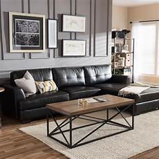 A Chic Apartment In Vasatan Featuring A Black And White Decor by Dobson Black Leather Modern Sectional Sofa Sectional Sofa A Chic Apartment In Vasatan Featuring A Black And White Decor