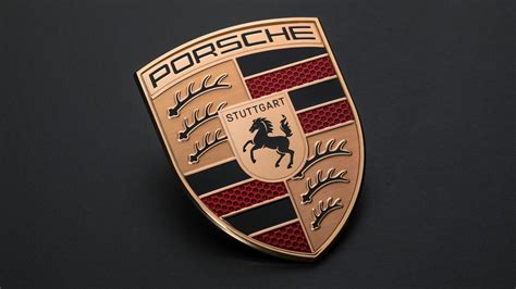 New Porsche crest hones the lines and forms of the…