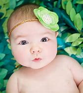 Image result for Cute Baby Mamraid Alamy