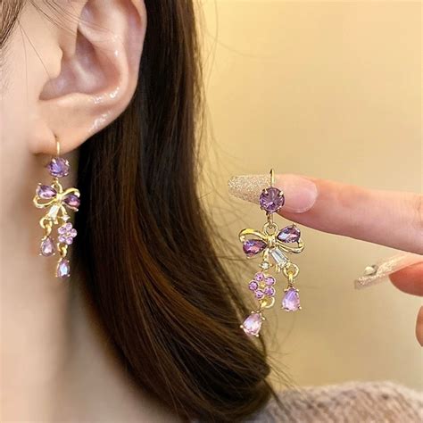 Purple bijou ribbon motif earring/pierce | ENCHANTE/je suis