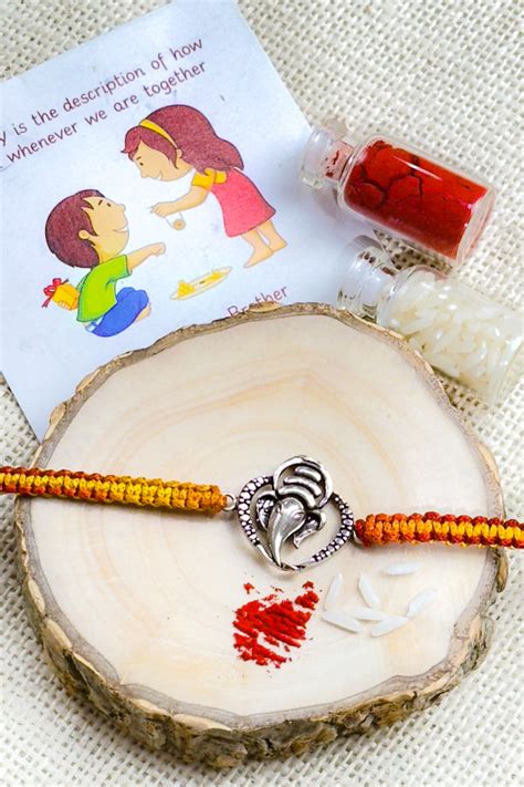 925 Silver Rakhi| Silver Blessings of Ganesha Rakhi – Swadeshi Pitara ...