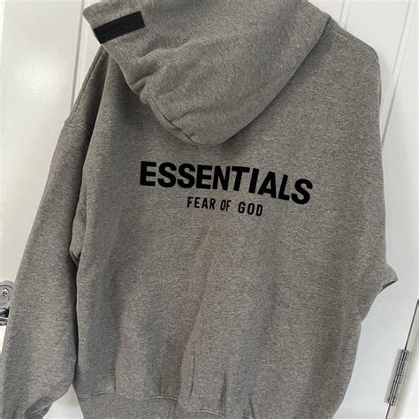 Essentials fear of god grey hoodie Great... - Depop