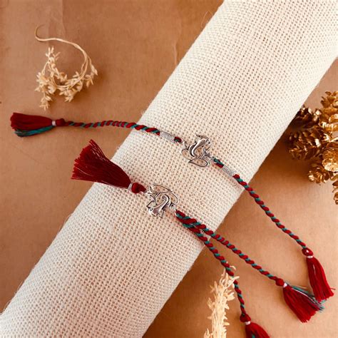 Hem Jewels® Silver Rakhi and Lumba for Bhaiya n Bhabhi | Ganesh Grace