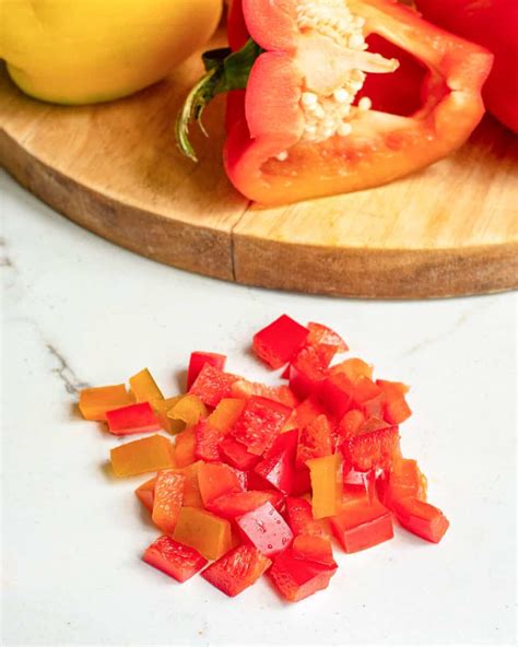 https://www.runningtothekitchen.com/wp-content/uploads/2023/06/how-to-cut-bell-peppers-4-960x1200.jpg