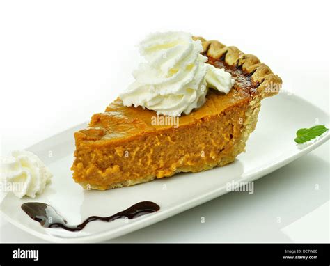 Slice of pumpkin pie Stock Photo - Alamy