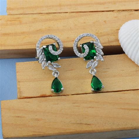 Green Color American Diamond Earrings With Antique Motif And Gem Finis ...