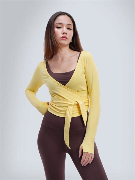 Yellow Cotton Wrap Top – CAVA Athleisure Pvt Ltd