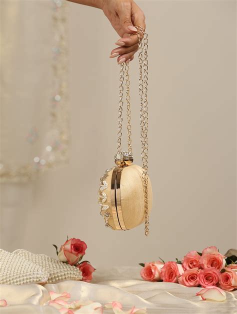 Buy Gold and Cream Metal Bag