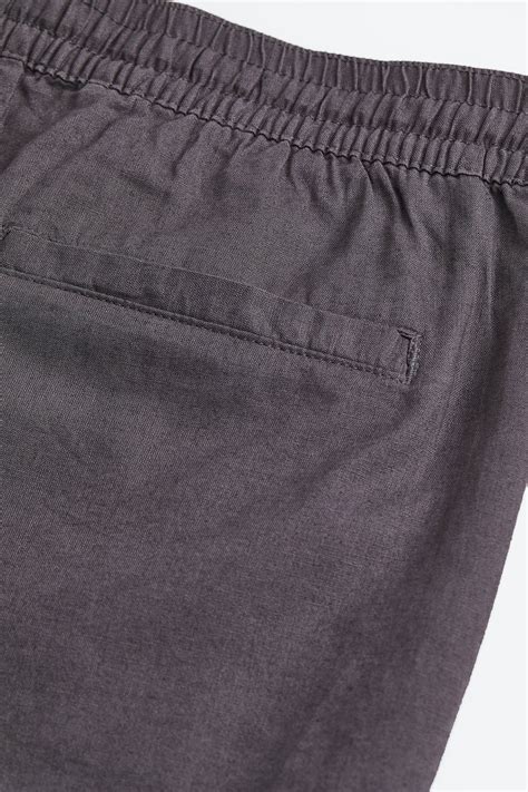 Loose Fit Linen-blend shorts - Dark grey - Men | H&M IN