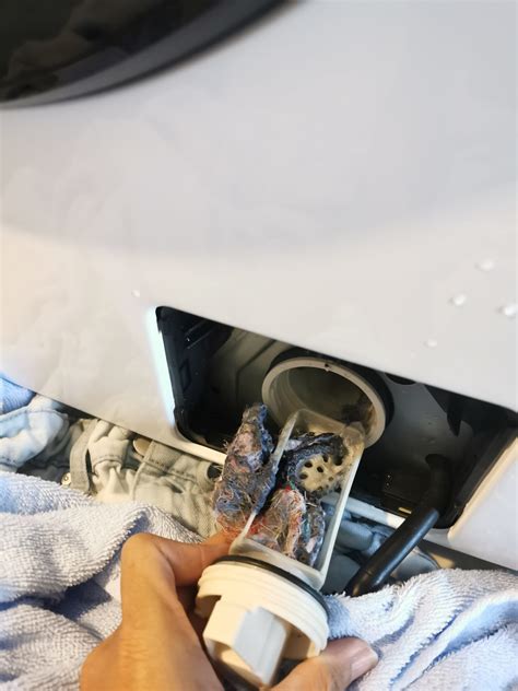 Washing Machine Clean Filter And Drain Piping - Washing Machine Repair & Cleaning Singapore