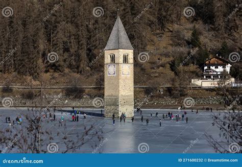 CURON VENOSTA, 06 January 2023: Tourists Walk On The Frozen Lake Of ...