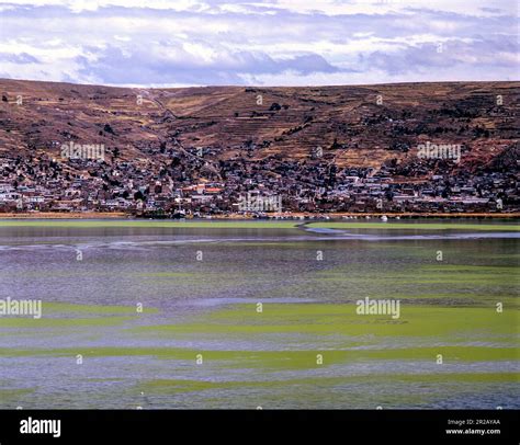 Titicaca lake and Puno city, Perú Stock Photo - Alamy