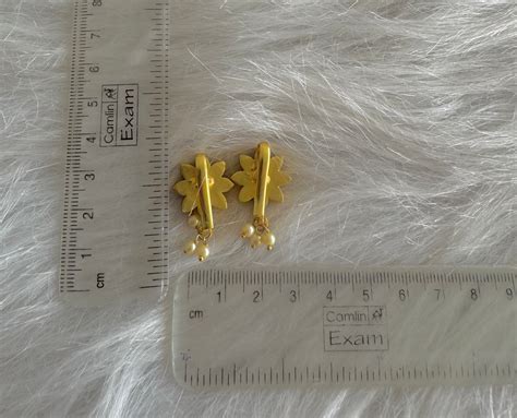 Gold tone pink-white kundan jadau flower bugadi earrings dj-51153 ...