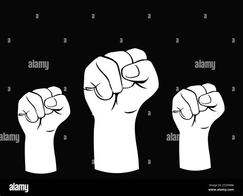 Three clenched fists raised up. The concept of protest, freedom ...