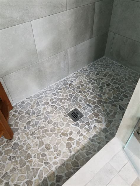 Stylish And Safe: 12 Tile Ideas For Shower Floors