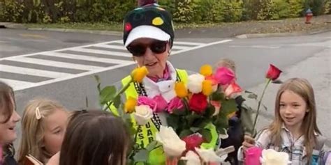 Students surprise 94-year-old crossing guard with birthday roses