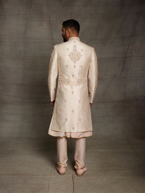 Overall embroidered sherwani in light gold color. – Rechannel Fashions