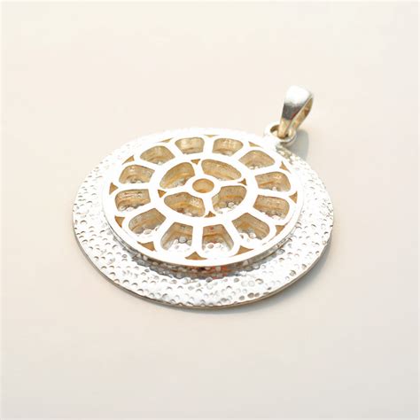 Buy Hammered Silver Mother's Symbol Pendant | Auroville.com – Auroville ...