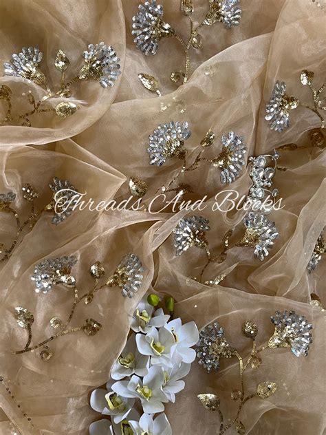 Swarnika Tissue Saree – Threads & Blocks