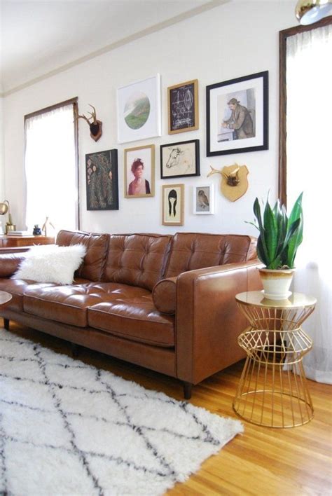 Perfect Placement: 12 Living Rooms That Nailed Hanging Art Above the Sofa | Leather living room ...