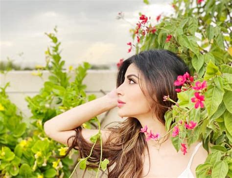 Mouni Roy Shies Away From Camera, Hides at The Back of Flowers – PICS
