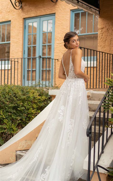 Dreamy Spaghetti Strap Lace Wedding Dress with Plunging Neckline
