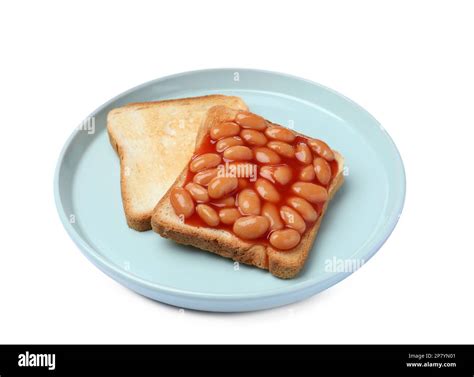 Delicious bread slices with baked beans on white background Stock Photo ...