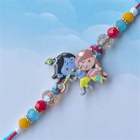 Mythical Mischief Duo Kids Rakhi with Krishna & Radha Cartoon Design ...