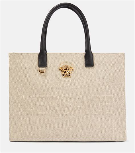 La Medusa canvas tote bag in beige - Versace | Mytheresa