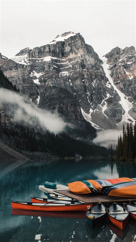 Download wallpaper 1350x2400 canoe, boats, lake, pier, mountains iphone ...