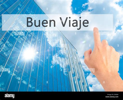 Buen Viaje (Good Trip in Spanish) - Hand pressing a button on blurred ...