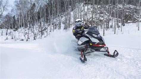 Rider going at high speed on a 2027 Ski-Doo Renegade snowmobile