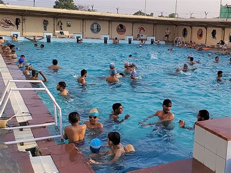 Around 800 people visit the Patan District Sports Complex swimming pool ...
